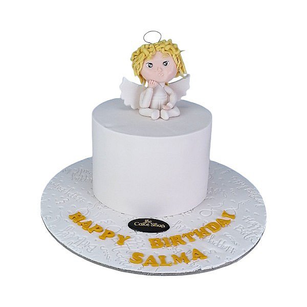 A baby angel-themed cake